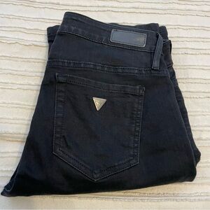 Guess dark blue Bootcut Jeans. Size 28. Features signature guess logo on pocket